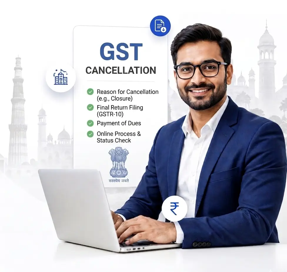 Man working on a laptop discussing GST cancellation processes.