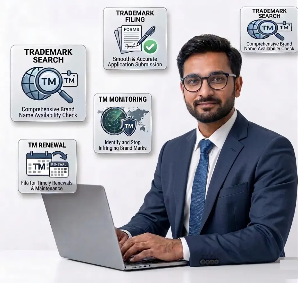 Trademark Objection Reply 1 Professional man working on a laptop with trademark services highlighted.